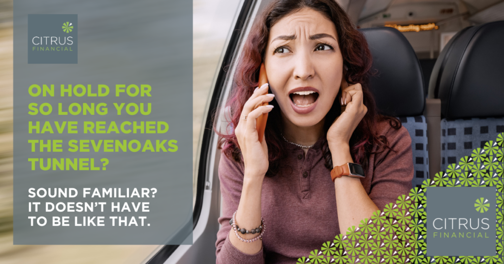 Frustrated woman speaking on the phone on a train