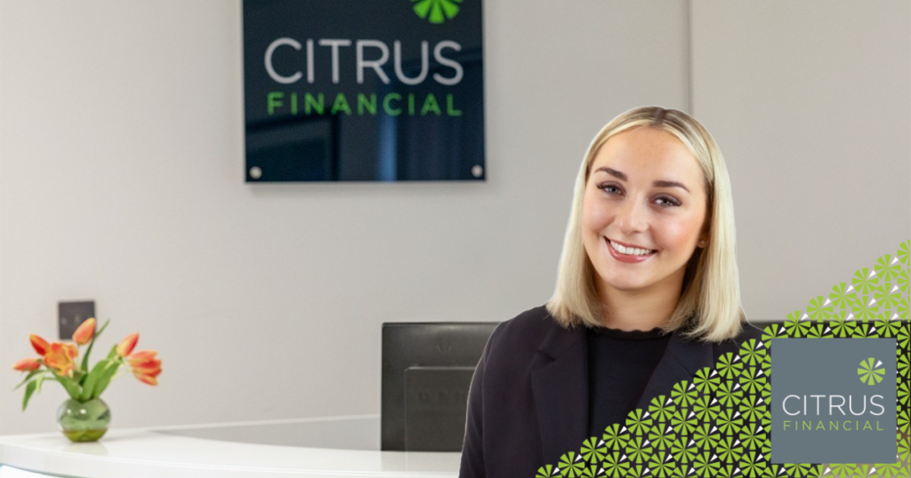 Phoebe Mills standing at reception in Citrus Financial