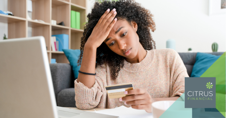 Person looking at a suspicious investment advert on a laptop